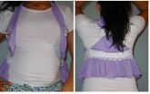 Camisa de manga com bolerio em cima.
